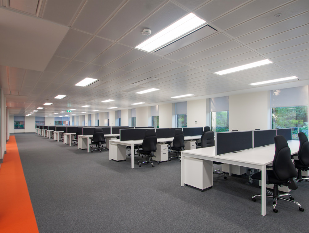 Apex Office Layout White Back to Back Desks along with Pedestals and Black Desk Screens and Office Chairs