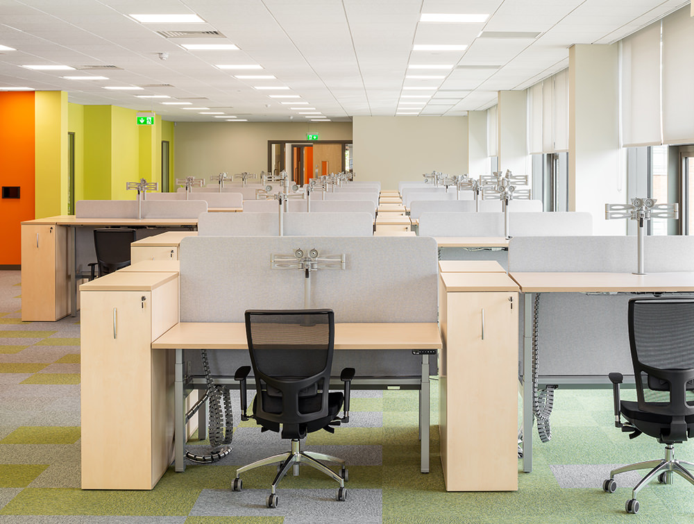 Leap Adjustable Desks with Acoustic Desk Dividers Ergonomic Monitor Arms and OZ Mesh Office Chairs