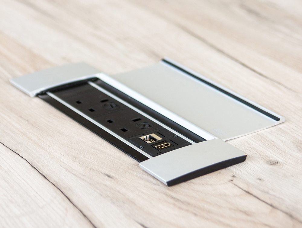 Plug Socket Accessory Embedded in Wood Finish Conference Table