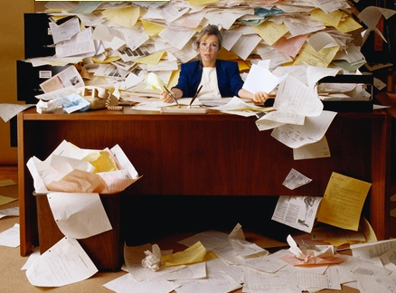 How to Boost Productivity by Improving Office Storage Messy Office Female